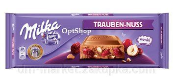 Шоколад молочный Milka Raisins & Haselnuts (орех с изюмом), 270г 955323977 фото