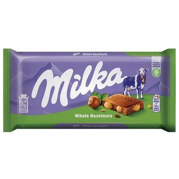 Шоколад молочный с цельныим лесными орехами Milka Whole Haselnuss, 100г 2466698781 фото